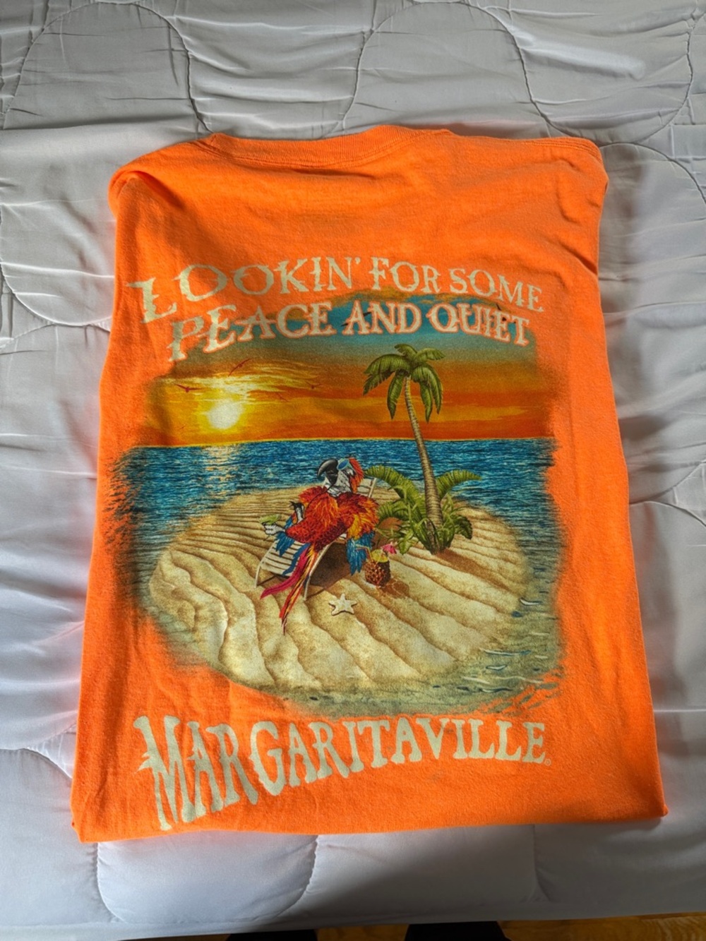 Margaritaville Orlando Resort Orange Short Sleeve Tee with Island Parrot Graphic
